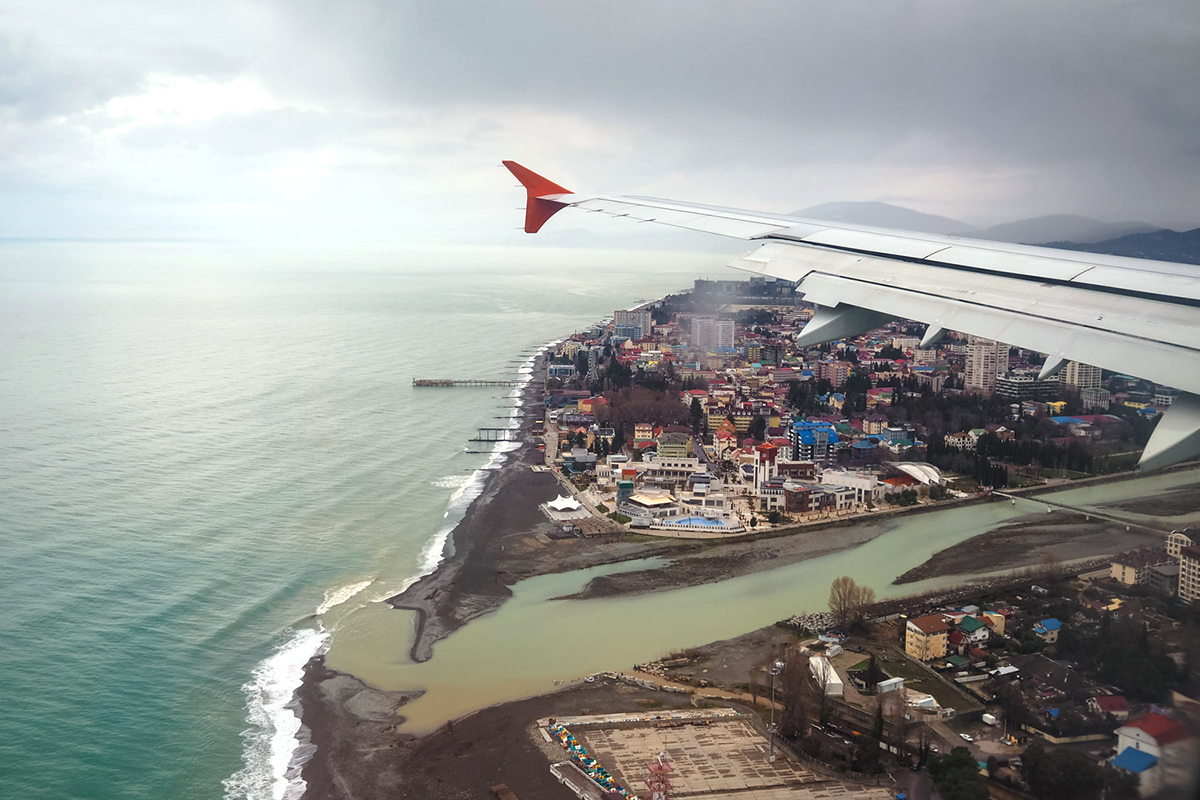 For many people the trip to Sochi begins with the same view. It takes three hours from Moscow to reach Sochi by plane. Sochi’s new international airport now handles dozens of domestic and international flights daily. One may reach city center from the airport terminal (28 km) by bus, train, or taxi.