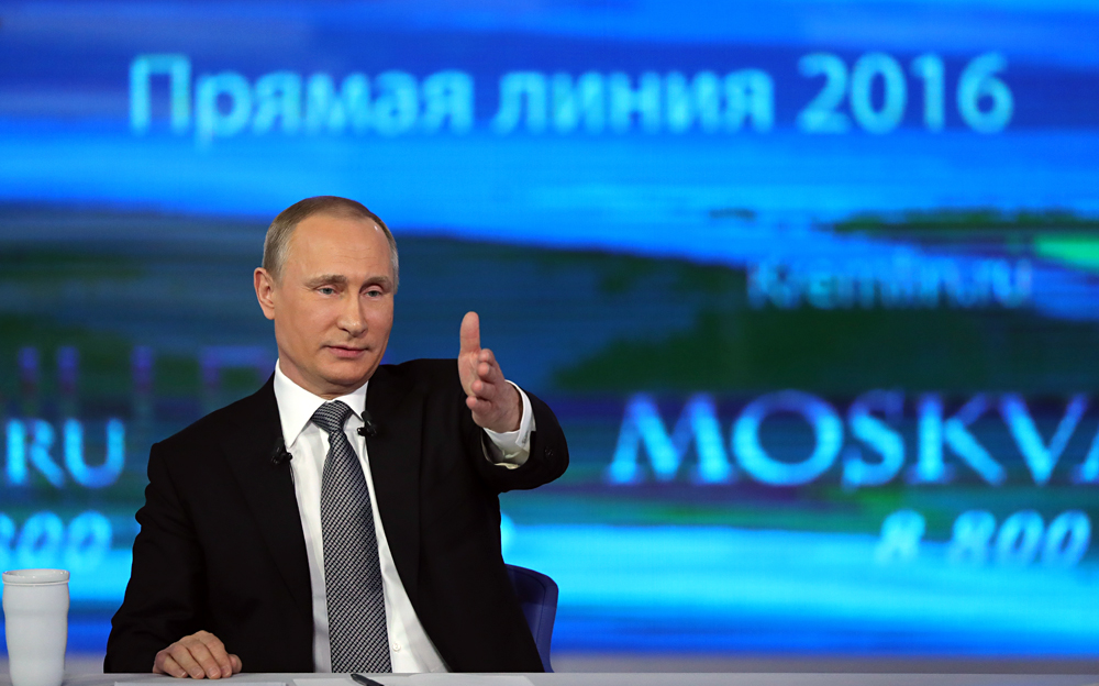 April 14, 2016. Russian President Vladimir Putin answers questions during the annual Direct Line with Vladimir Putin broadcast live by Russian TV channels and radio stations. The event takes place in the main studio of the Gostiny Dvor exhibition center, Moscow.