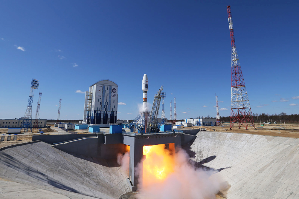 A Soyuz-2.1a rocket booster carrying Lomonosov, Aist-2D and SamSat-218 satellites blasts off from a launch pad at the Vostochny Cosmodrome.