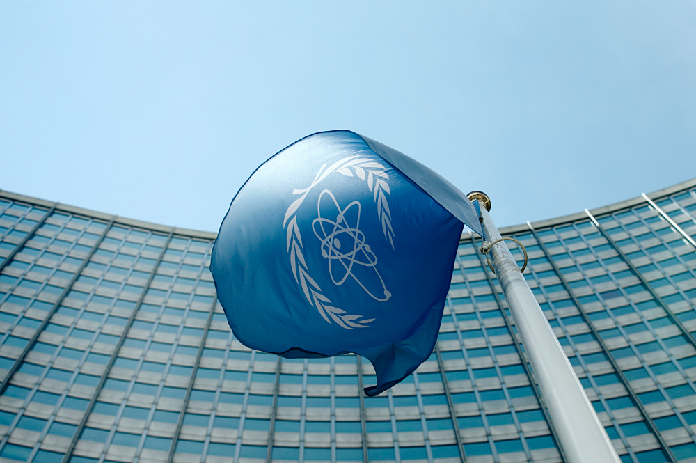 The flag of the International Atomic Energy Agency (IAEA) flies in front of its headquarters in Vienna, Austria