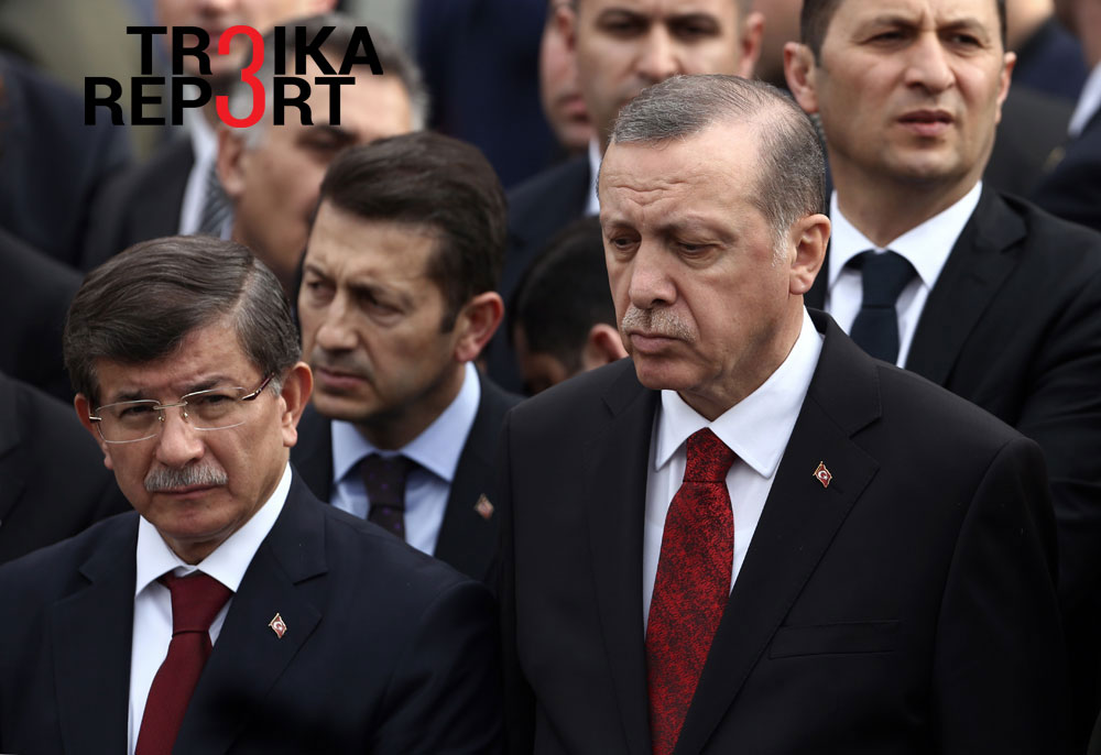Turkey's President Recep Tayyip Erdogan, right, and Prime Minister Ahmet Davutoglu, left, arrive to attend funeral prayers for army officer Seckin Cil, who was killed in Sur, Diyarbakir Wednesday, in Ankara, Turkey, Thursday, Feb. 18, 2016.