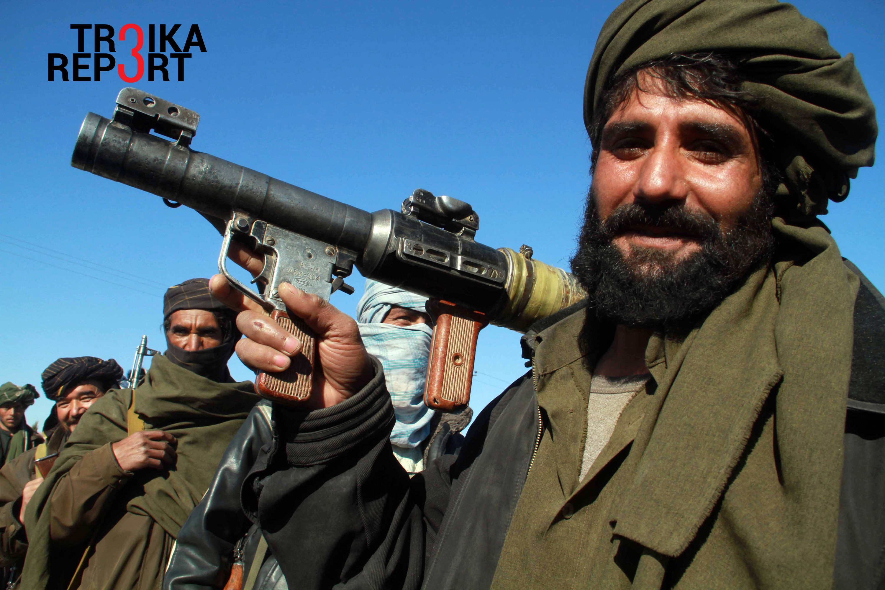 A Taliban militant poses for a picture after joining the Afghan government's reconciliation and reintegration programme, in Herat January 30, 2012. Some thirty Afghan Taliban have joined the program, Herat governor Daoud Shah said.