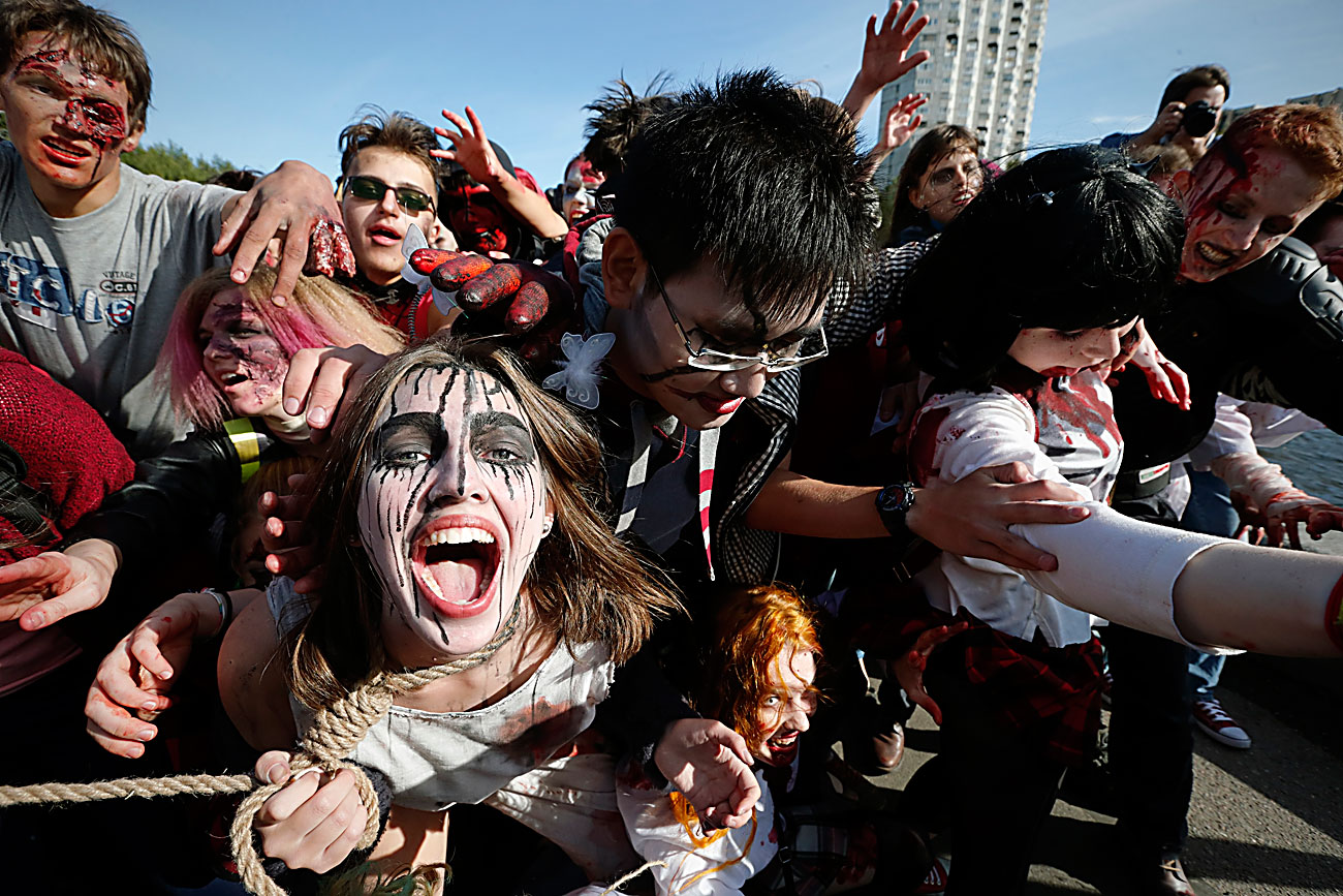 People costumed as ghouls and zombies gather at a Zombie flash mob in central St.Petersburg, Russia, 28 August 2016. The Zombie flash mob refers to the worldwide annual events of the 'Zombie Walk' where people dress up as zombies. The Zombie Walk was originated in the USA and took place for the first time in Sacramento in 2001