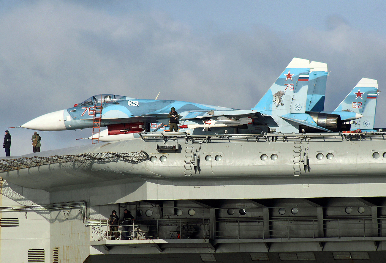 Sukhoi Su-33 Flanker-D fighters aboard the aircraft carrier Admiral Kuznetsov sails together with the Russian Northern Fleet's carrier battle group through the English Channel. 