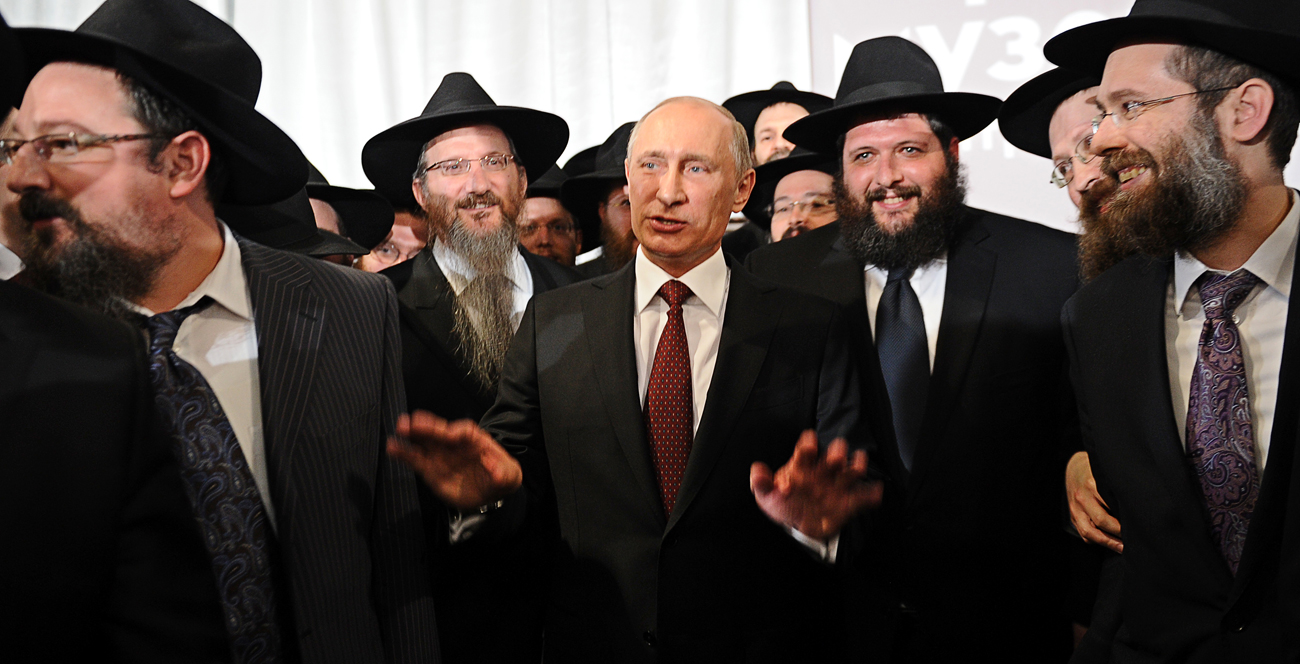Russia's President Vladimir Putin speaks at a ceremony marking the handover of the Schneerson library at the Jewish Museum and Tolerance Center in Moscow, on June 13, 2013. 