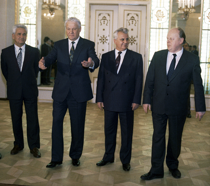 Russian President Boris Yeltsin (second left), Ukrainian President Leonid Kravchuk (second right) and Chairman of the Belorus Supreme Council Stanislav Shushkevich (right) in Belovezhskaya Pushcha at the signing of the Agreement establishing the CIS (Commonwealth of Independent States).