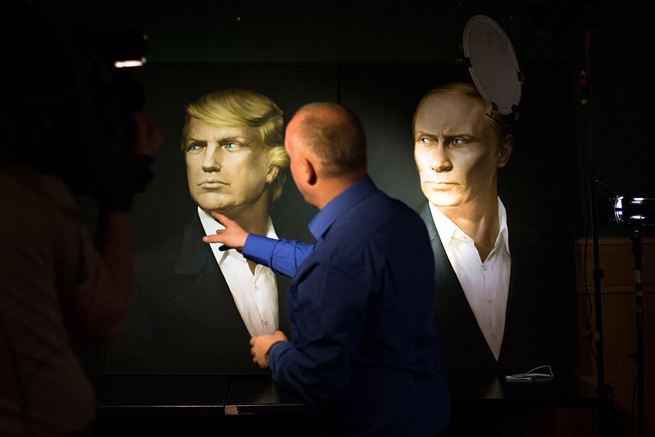 A portrait of U.S. President-elect Donald Trump, with a portrait of Russian President Vladimir Putin during a live telecast of the U.S. presidential election in the Union Jack pub in Moscow, Russia.