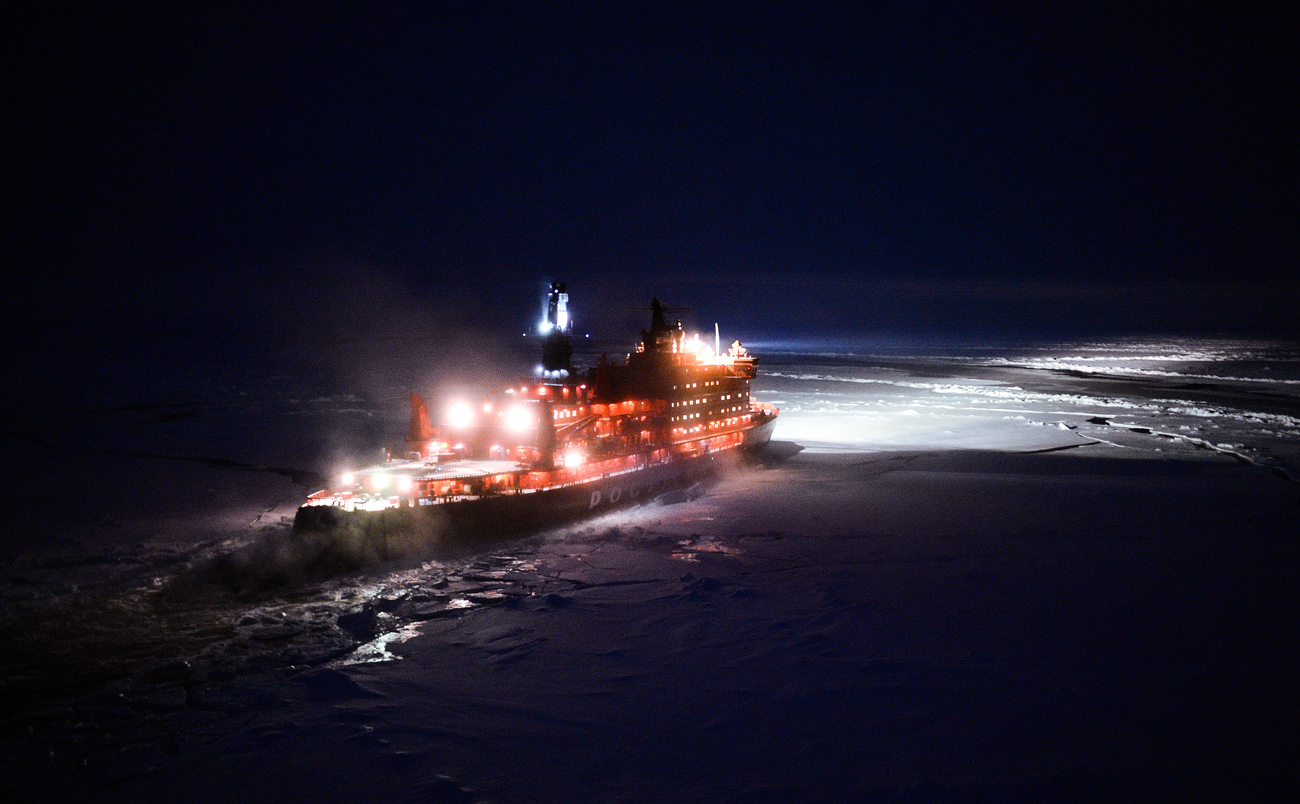 A helicopter view of the "NS 50 Let Pobedy" nuclear-powered icebreaker sailing toward the North Pole.