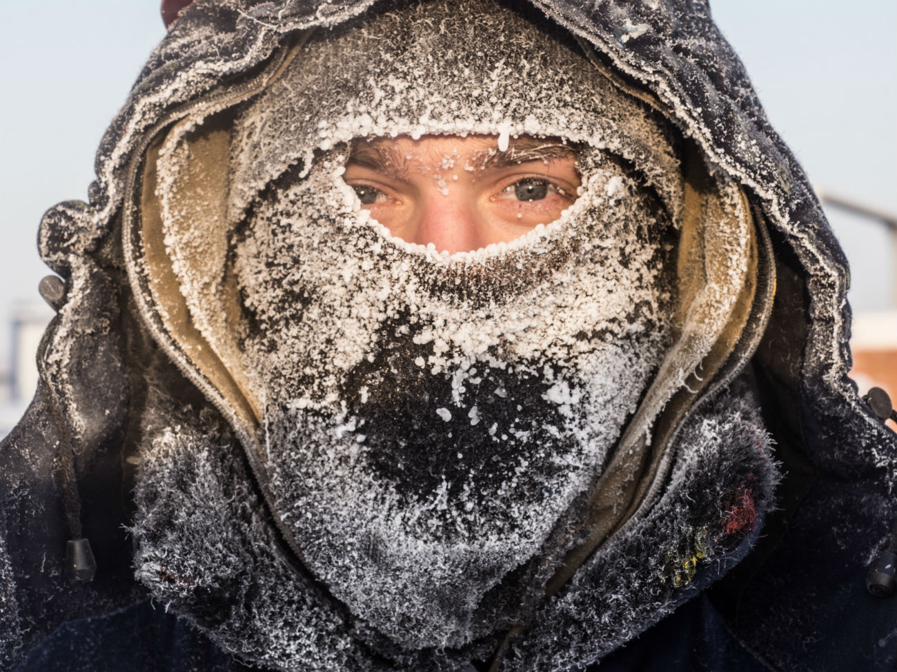 A young man near Nefteyugansk. The temperature dropped to minus 62 degrees Celsius (-79.6 Fahrenheit), Dec. 22, 2016.