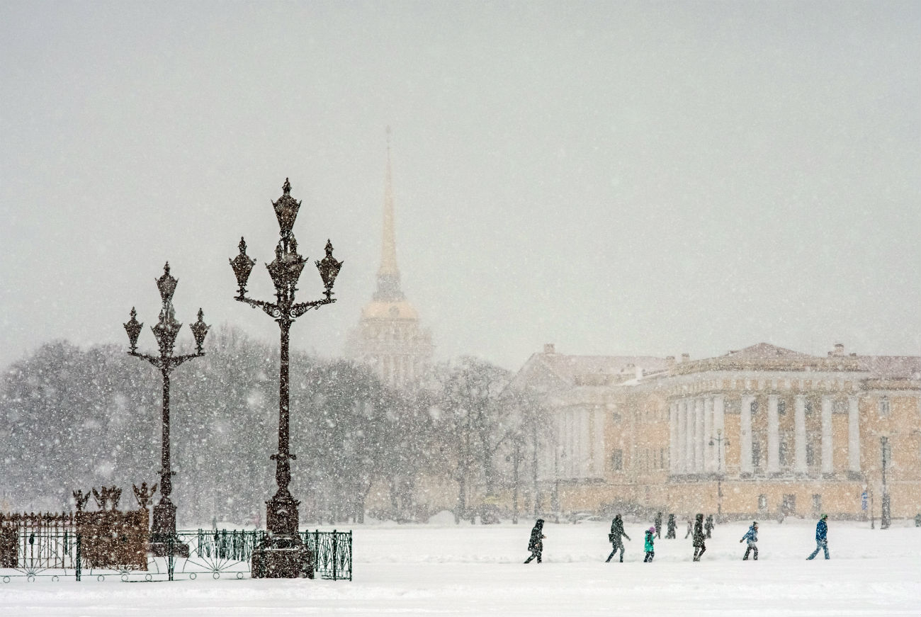 Snowfall on Palace Square in St. Petersburg.