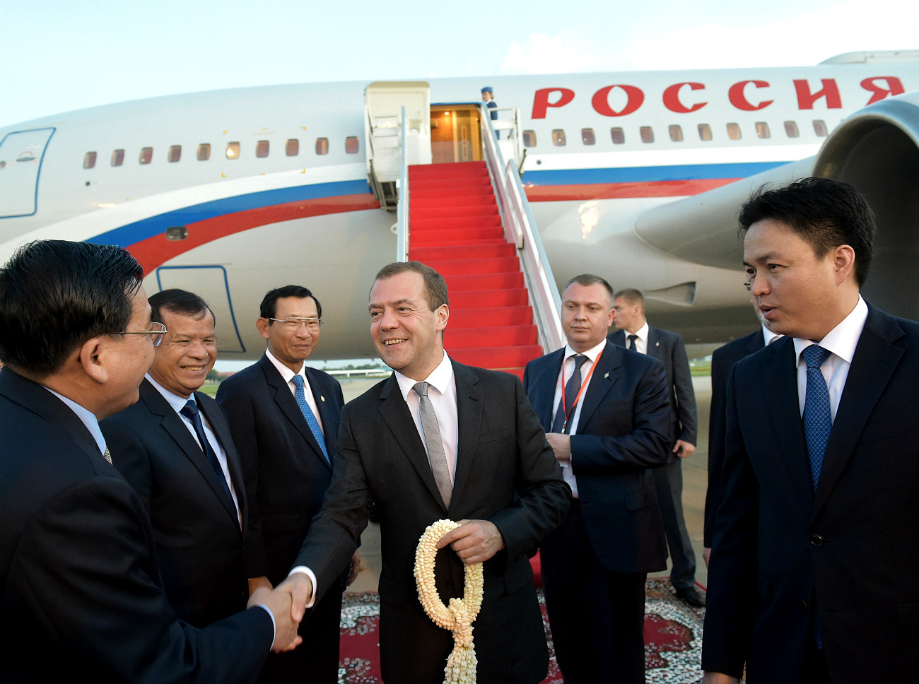 November 23, 2015. Russian Prime Minister Dmitry Medvedev, center, is welcomed at Phnom Penh International Airport during his working visit to the Kingdom of Cambodia.