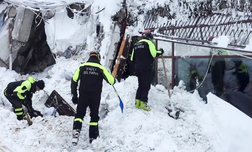 Firefighters work at Hotel Rigopiano in Farindola, central Italy, after it was hit by an avalanche, in this handout picture released on January 20, 2017 provided by Italy's Fire Fighters.