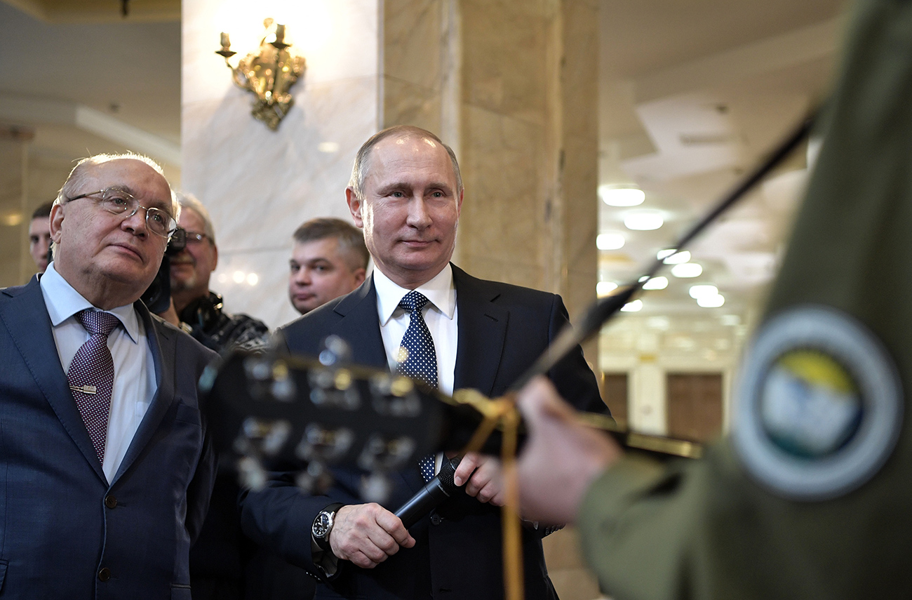 Russian President Vladimir Putin and Lomonosov Moscow State University Rector Viktor Sadovnichy, left, at a meeting with students held as part of the annual Forum of Student and Youth Organizations' Leaders, Jan. 25, 2017.