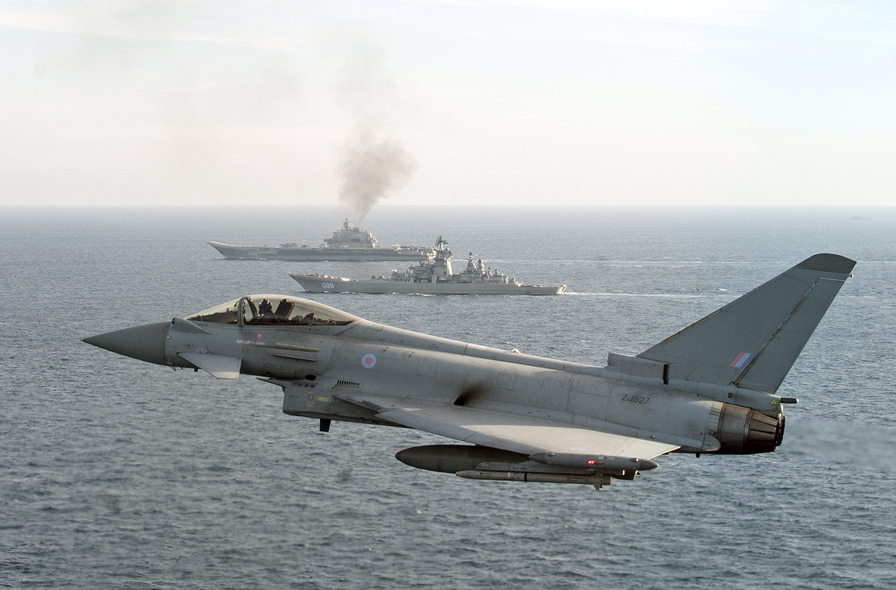 A RAF Typhoon escorts the Russian warships Pyotr Veliky and Admiral Kuznetsov.