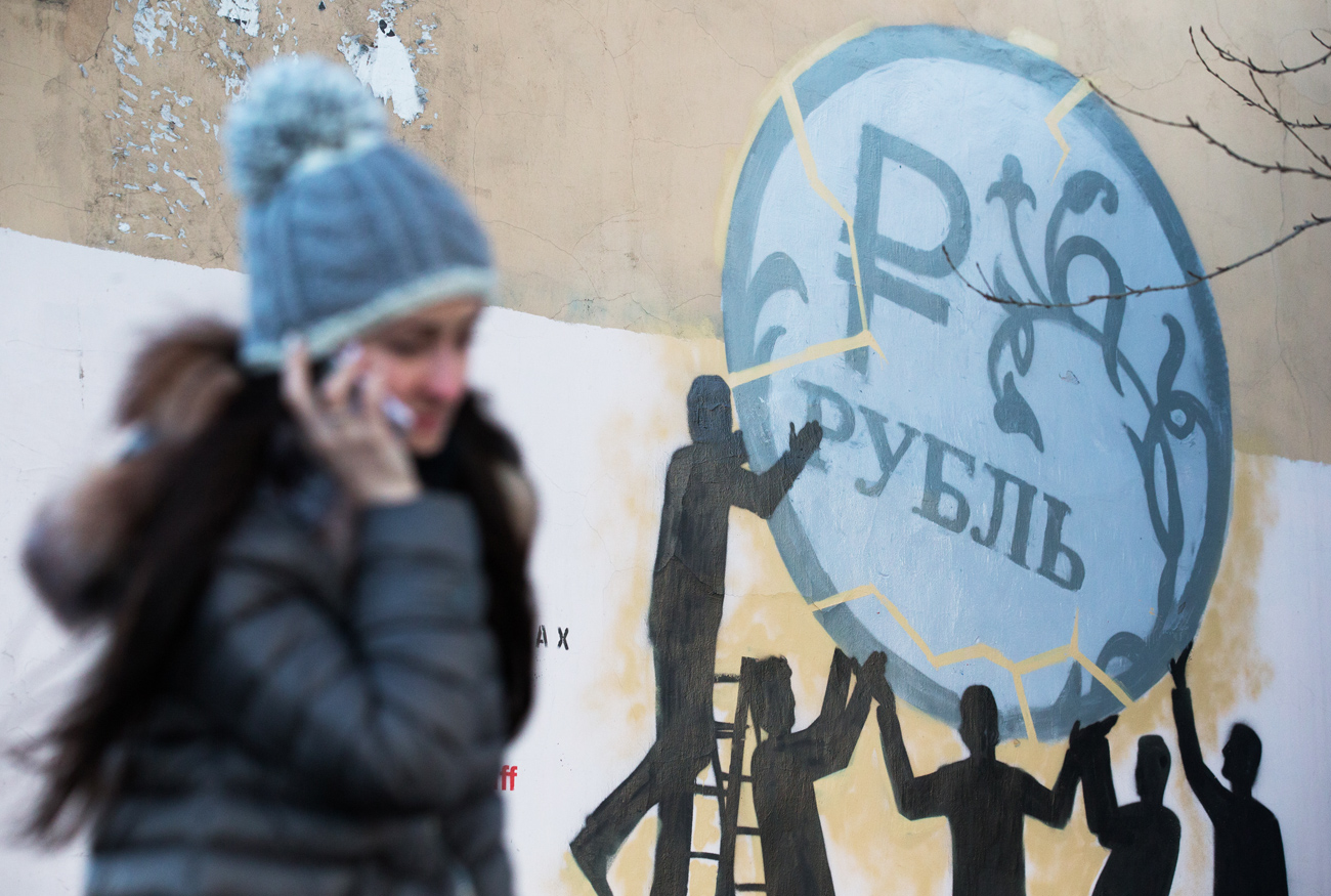 Graffiti in support of the rouble on the wall of building #42 on Borovaya Street in St Petersburg.