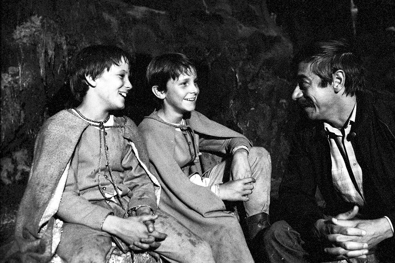 Director Vladimir Grammatikov talking to young artists British schoolchildren Nick Pickard and Christian Bale before filming the feature film "Mio, my Mio."