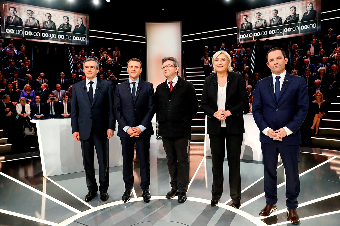 French presidential election candidates (LtoR) Francois Fillon, Emmanuel Macron, Jean-Luc Melenchon, Marine Le Pen and Benoit Hamon, pose before a debate organised by French private TV channel TF1 in Aubervilliers, outside Paris, France, March 20, 2017