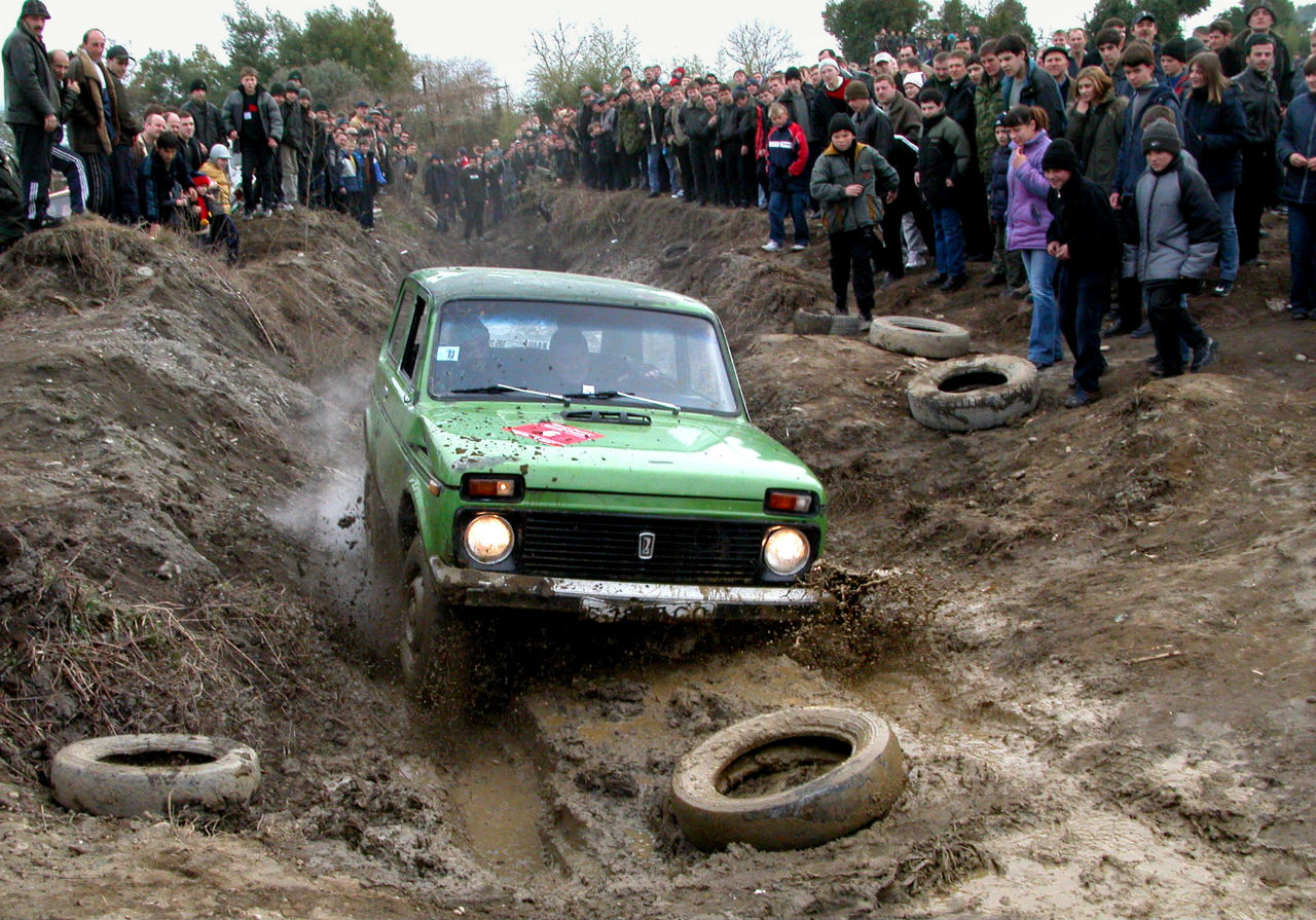 TAS31:SOCHI, RUSSIA. FEBRUARY 22. Jeep trial race (in pic) dedicated to the Fatherland Defender's Day was held near Sochi. Seventeen crews on Niva nd UAZ automobiles competed for the trophy of the Sochi department of the United Russia party.