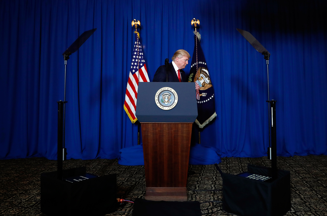 President Donald Trump walks from the podium after speaking at Mar-a-Lago in Palm Beach, Fla., April 6, 2017, after the U.S. fired a barrage of cruise missiles into Syria.
