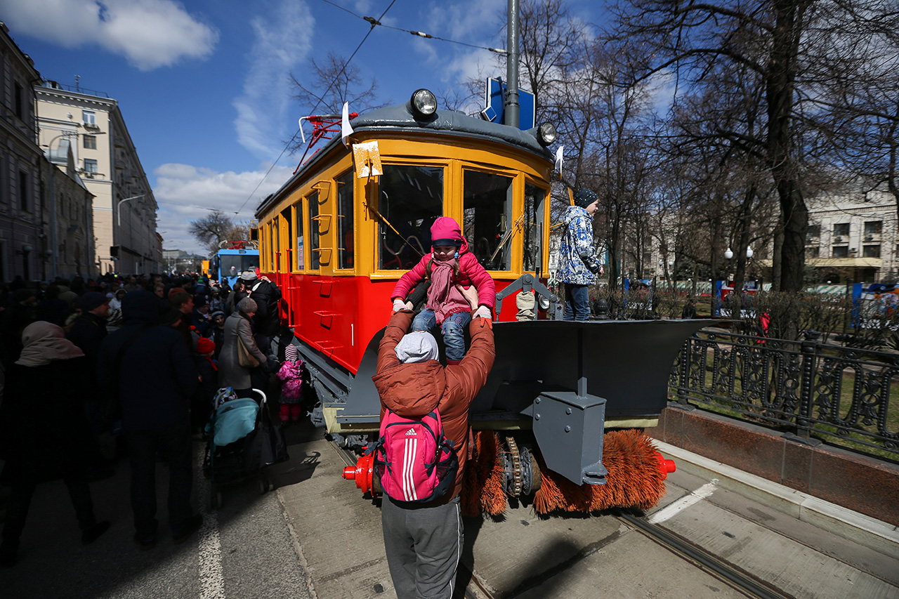 The tram parade was a hit with everyone, especially the kids.