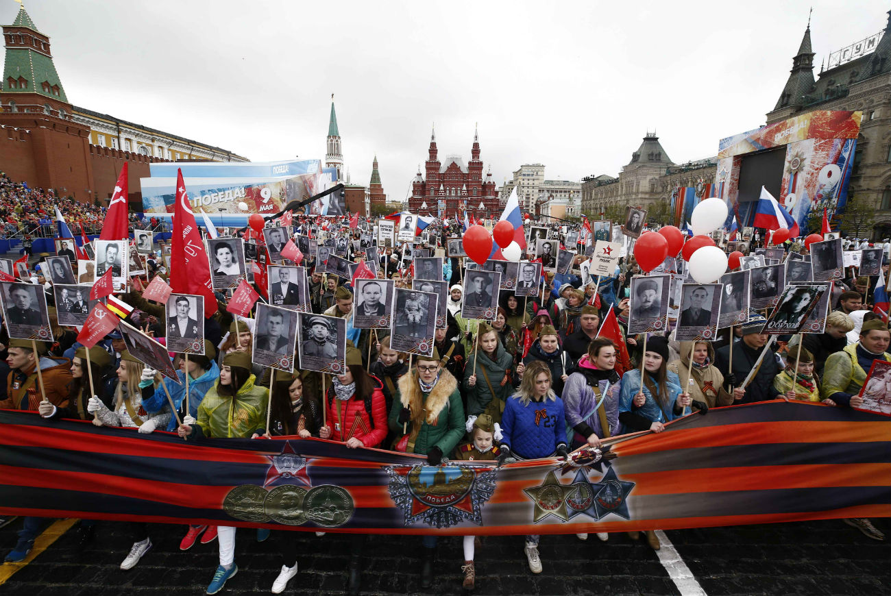 On May 9, the day when Russia marks the end of the war with Nazi Germany, the children and grandchildren of veterans of the Great Patriotic War line the streets of Russia holding portraits of their relatives.