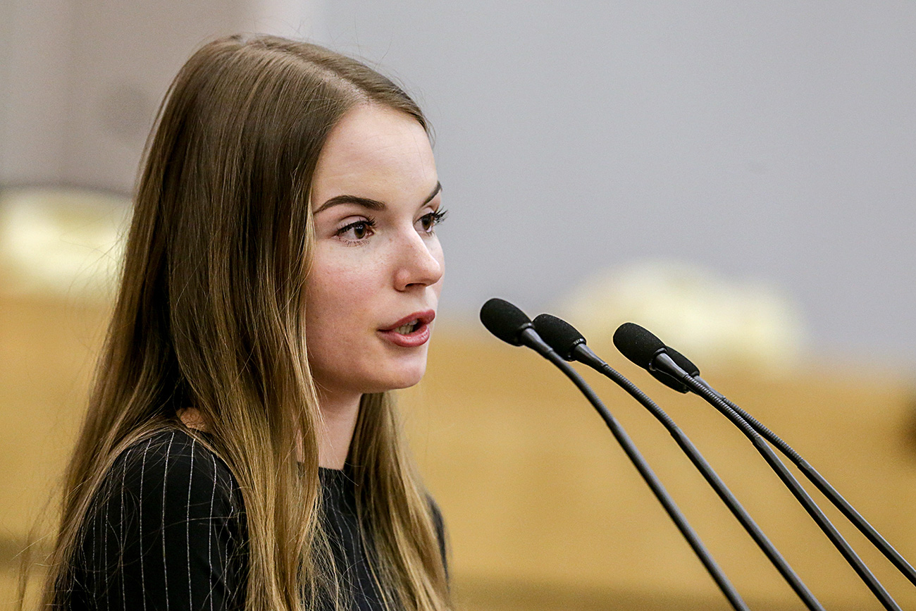 Russian video blogger Sasha Spilberg speaks during parliamentary hearings on the youth policy in Russia. 