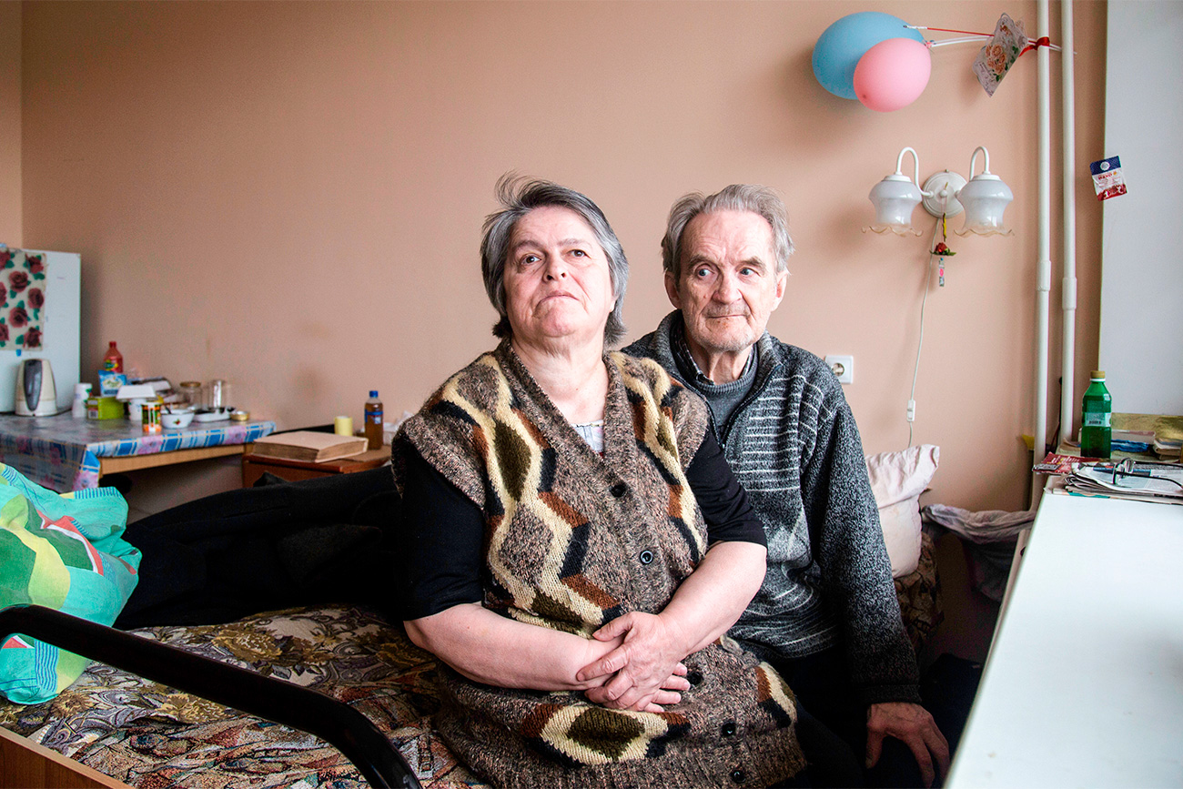 Natalia Alekseeva (66) and Anatoly Alekseev (76) met at a state boarding house for the retired and disabled. This is where they are now living. Natalia has been blind from the age of 3, and Anatoly is visually impaired. They both were brought to the boarding house against their will: Natalia’s sister had refused to take care of her disabled relative, and Anatoly had been left homeless, plus his son refused to give him money. They used to like to walk together in the nearest park, but now as Natalia is barely able to walk they almost never leave the territory of the boarding house. // Sometimes this judgement is what stops old people from having a new family, despite sociologists saying that relations between couples (including transgender partnerships) cannot be substituted by relations with friends at any stage of life.