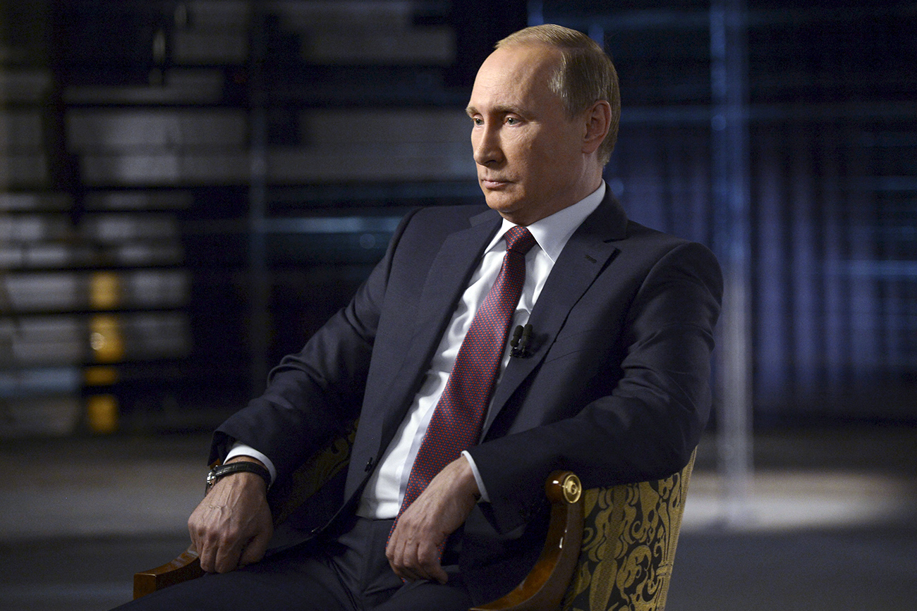 FILE PHOTO. Russian President Vladimir Putin gives an interview