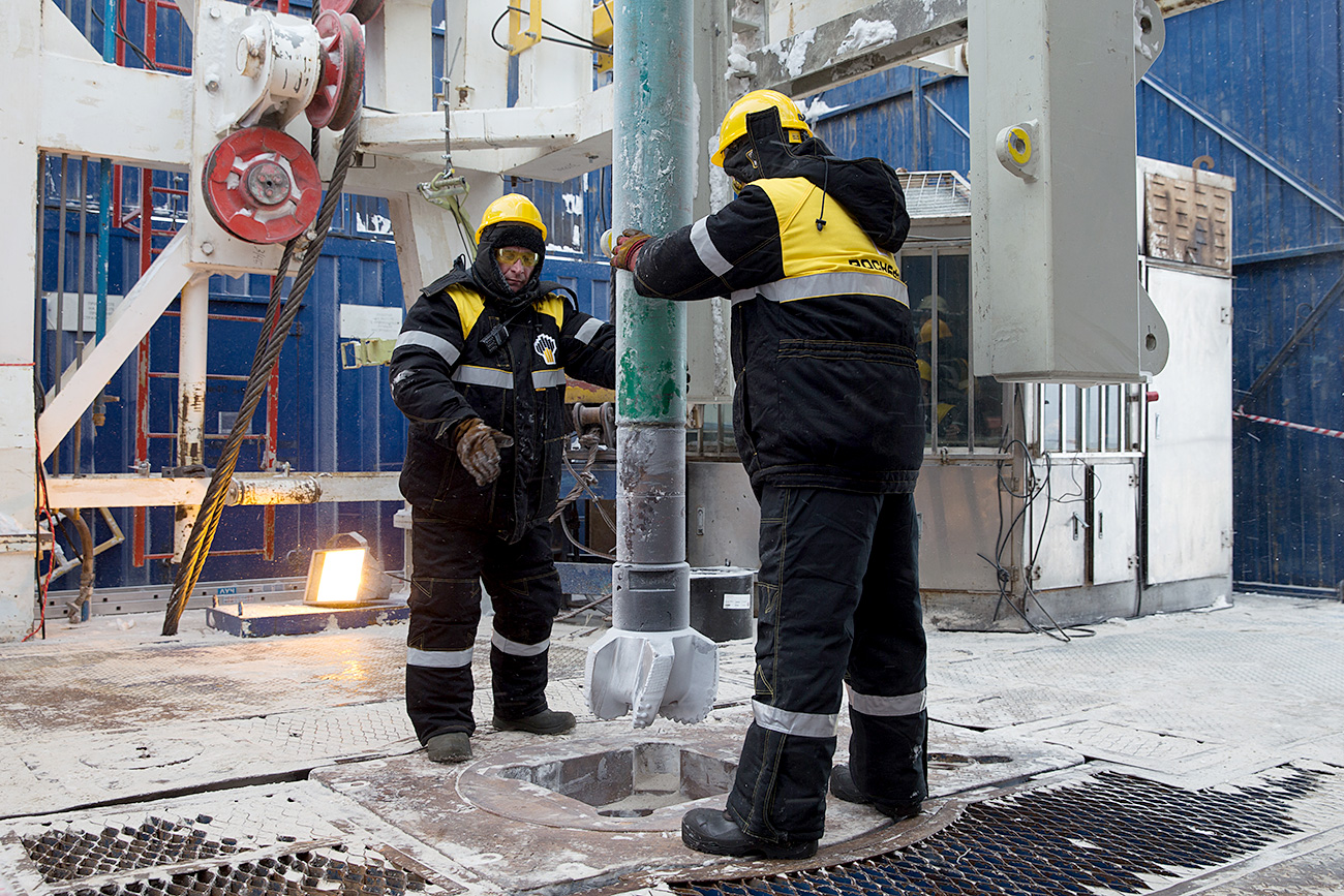 Personnel of Rosneft oil giant during the launch of drilling of the Tsentralno-Olginskaya well, the northernmost well on the Russian Arctic shelf.