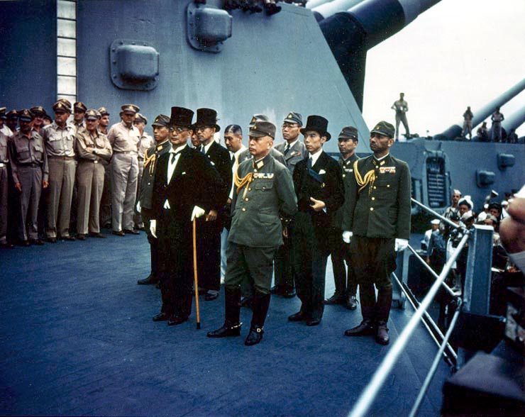 Representatives of Japan stand aboard USS Missouri prior to signing of the Instrument of Surrender.