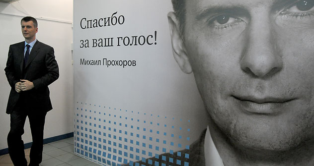 Prôkhorov diante de banner com os dizeres "Obrigado pelo seu voto!" Foto: AFP / EastNews