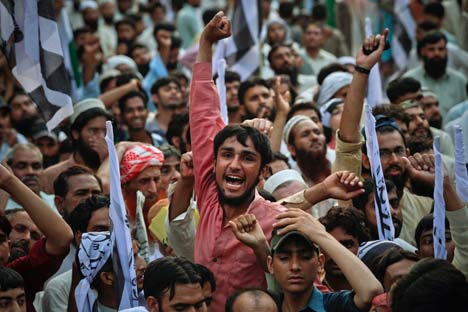 A supporter of the banned Islamic organization Jamaat-ud-Dawa shouts anti-American slogans during a rally in favour of al Qaeda leader Osama bin Laden in Lahore May 15, 2011. Source: Reuters/Vostock photo