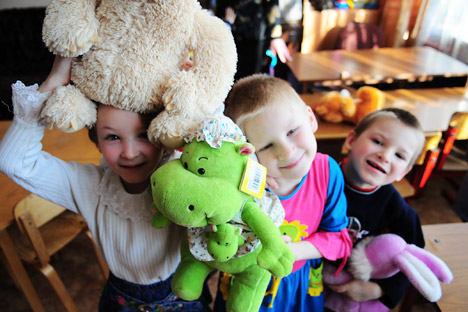 It remains to be seen how effective a new system for matching potential parents with children will be. Pictured: The children from the Shakhovsky Social Orphanage in the Moscow Region. Source: ITAR-TASS  