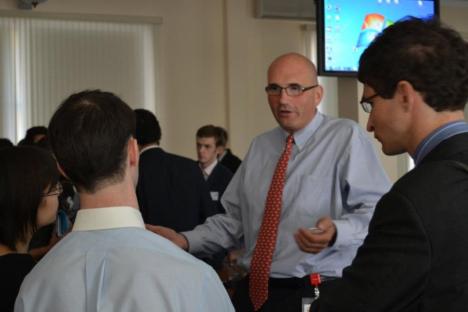 Bernard Sucher, the member of the Board of Directors at Aton Group, is talking with students as a guest speaker at the 2011 Stanford U.S.-Russia Forum in Moscow. Source: Pavel Koshkin