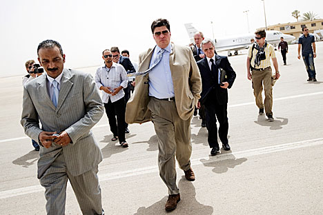 Russian envoy to Africa, Mikhail Margelov (C), arrives at Benghazi airport on June 7, 2011 for meetings with Libyan rebel leaders in the first trip by a top Russian official to their stronghold. Source: AFP/East News