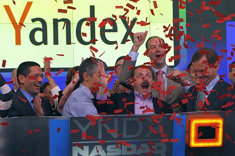 Arkady Volozh (3rd right), founder, CEO and largest stakeholder of the Russian search engine Yandex, celebrates the IPO in New York. Source: Reuters / Vostock Photo