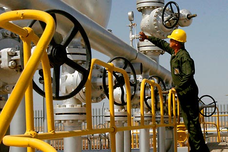 Iranian oil technician Majid Afshari checks the oil separator facilities in Azadegan oil field, near Ahvaz, Iran. Source: AP