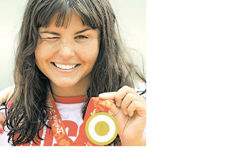 Eight-time world champion Larisa Ilchenko took gold in the inaugural 10km open water swimming marathon