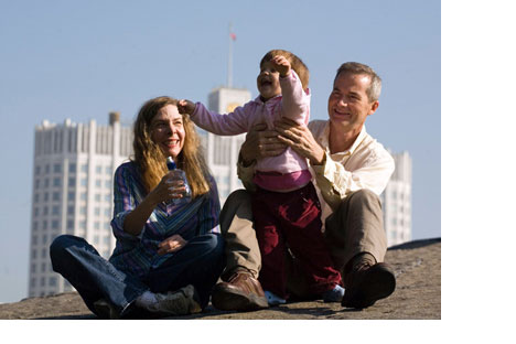 American adoptive parents play with their Russian-borndaughter in Moscow