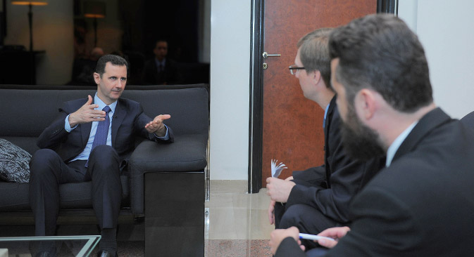 Bashar al-Assad: "A missão da conferência de Genebra é preparar terreno para a regulação política na Síria" Foto: AFP / East News