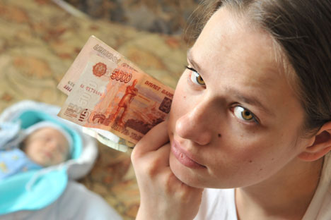 In der Mehrzahl der russischen Familien bestimmen die Frauen über die Ausgaben. Foto: ITAR-TASS.