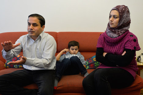 Jarob Rashid (links) mit seiner Familie. Foto: Michail Sinizyn