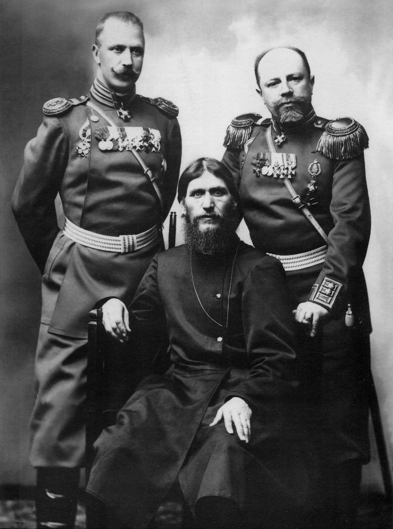 He was also the official photographer of many state organizations, including the Interior Ministry, the Navy and Army Ministries, and the State Duma. // L-R: Colonel Loman, Grigory Rasputin, General Putyatin
