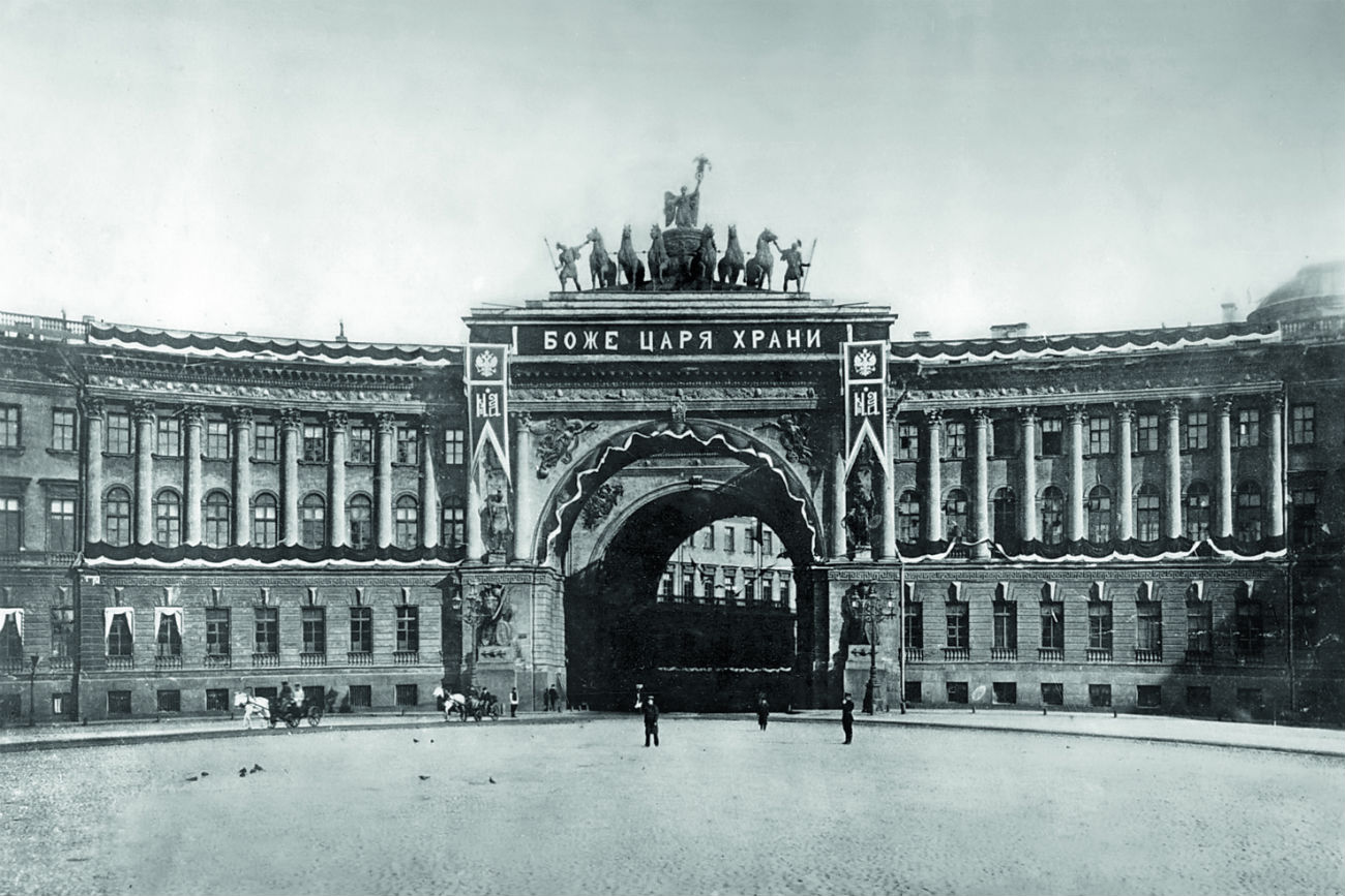  Almost all the palaces and mansions that were damaged during the Civil War were restored using photographs taken by Bulla before the Revolution. // "God, Save the Tsar" caption at the General Staff Building in St. Petersburg