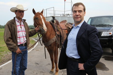 Imports of U.S. livestock - and cowboys - expanded during the presidency of Dmitry Medvedev (right). Source: Photoshot / Vostock-Photo