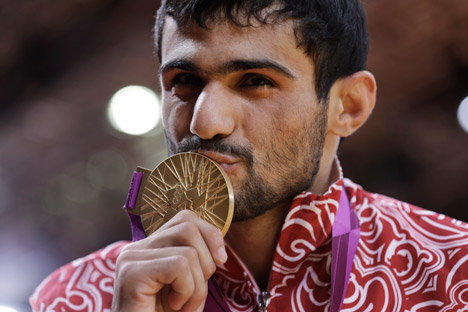 Arsen Galstyan: I hope my medal will bring people a little joy for Krymsk. I want the flood victims to hold their heads high and find the strength to cope with their problems and go on living. Source: AP 