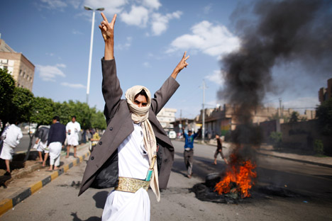 The wave of anti-Americanism in the Middle East is hardly likely to change the mind of American politicians, according to Russia's experts. Pictured: A participant of a recent anti-American protest in Yemen. Source: Reuters / Vostock Photo 
