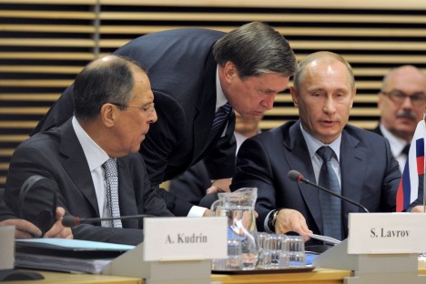 Pictured (L-R): Russia Foreign Minister Sergei Lavrov, Russian Presidential Aide Yuri Ushakov  Russian Presidnet Vladimir Putin. Source: Kommersant