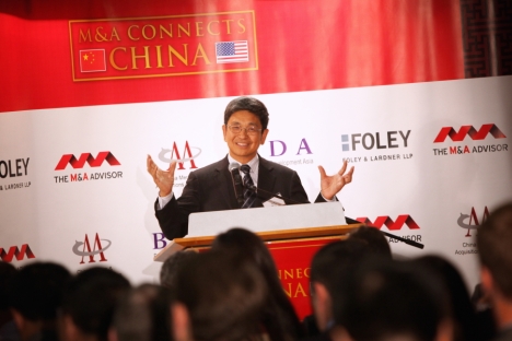 Yuan Tian, chairman of the China Entrepreneurs Forum, speaking at the recent M&A summit in New York. Source: Press Photo