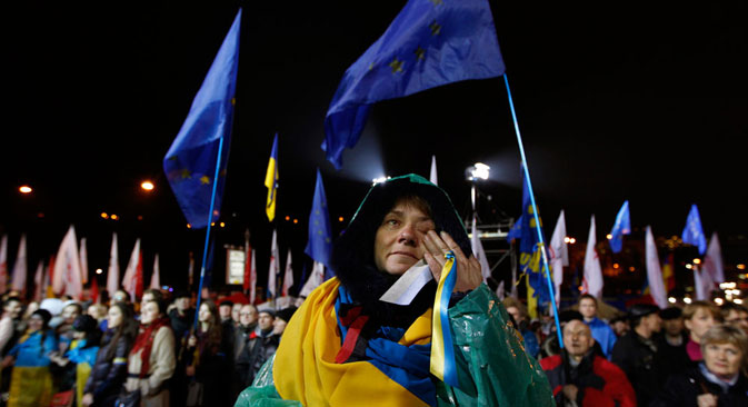 Passionate protest: a woman wipes away a tear at a demonstration in Kiev against Ukraine’s rejection of the EU agreement. Source: Reuters
